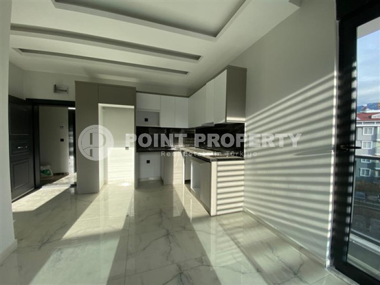 Новая однокомнатная квартира, общей площадью 55 м2, в престижном районе Оба.-id-3779-фото-2