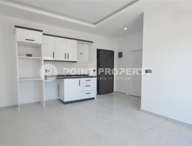 New 1+1 apartment in a beautiful, quiet area of Kargicak.-id-3782-photo-1