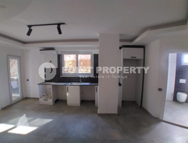 Новая квартира 1+1 в чистовой отделке с оригинальной планировкой.-id-3788-фото-2