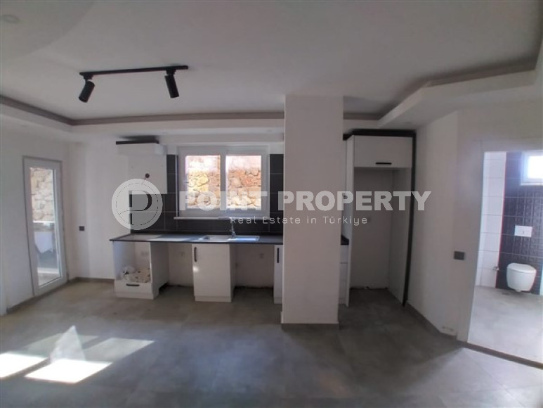 Новая квартира 1+1 в чистовой отделке с оригинальной планировкой.-id-3788-фото-2