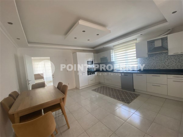 Просторная квартира 3+1 с мебелью и бытовой техникой в 200 метрах от центра района Махмутлар.-id-3801-фото-3