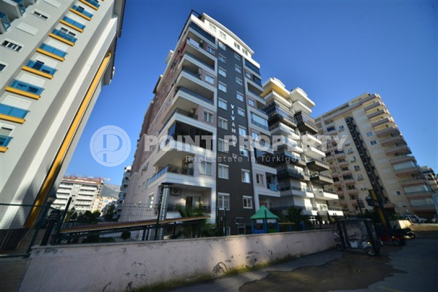 Очаровательные апартаменты с планировкой 3+1 на 2 этаже комплекса, район Махмутлар-id-3810-фото-2