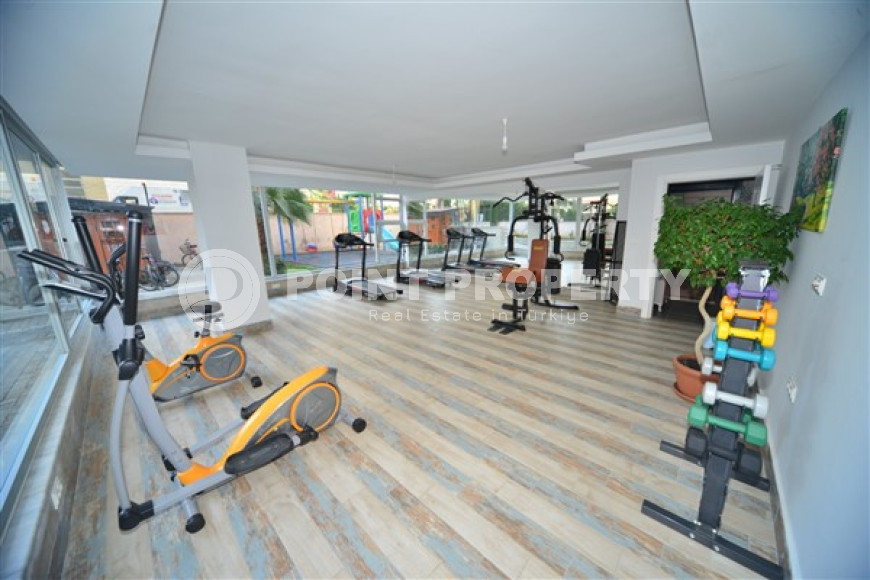 Очаровательные апартаменты с планировкой 3+1 на 2 этаже комплекса, район Махмутлар-id-3810-фото-8