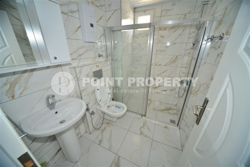 Очаровательные апартаменты с планировкой 3+1 на 2 этаже комплекса, район Махмутлар-id-3810-фото-17