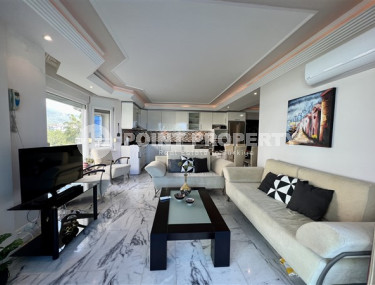 Three-room apartment with modern design on the seashore in the Tosmur area.-id-3820-photo-1
