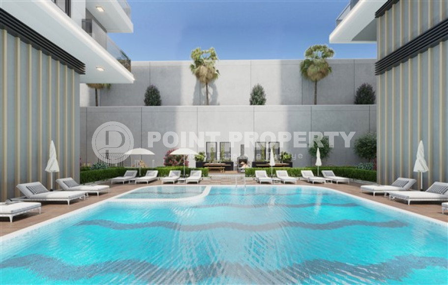 Apartments with layouts 1+1, 2+1, 3+1 in a complex under construction in Mahmutlar, 850 m to the sea-id-1042-photo-3