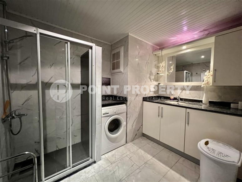 Трехкомнатные апартаменты с современным дизайном на берегу моря в районе Тосмур.-id-3820-фото-9