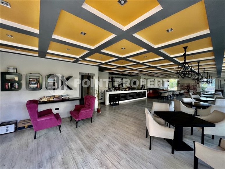 Трехкомнатные апартаменты с современным дизайном на берегу моря в районе Тосмур.-id-3820-фото-13