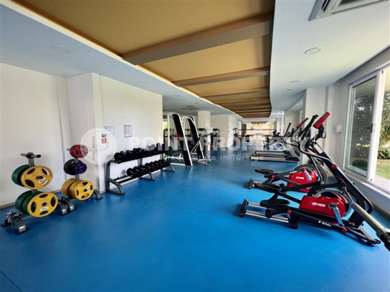 Трехкомнатные апартаменты с современным дизайном на берегу моря в районе Тосмур.-id-3820-фото-16