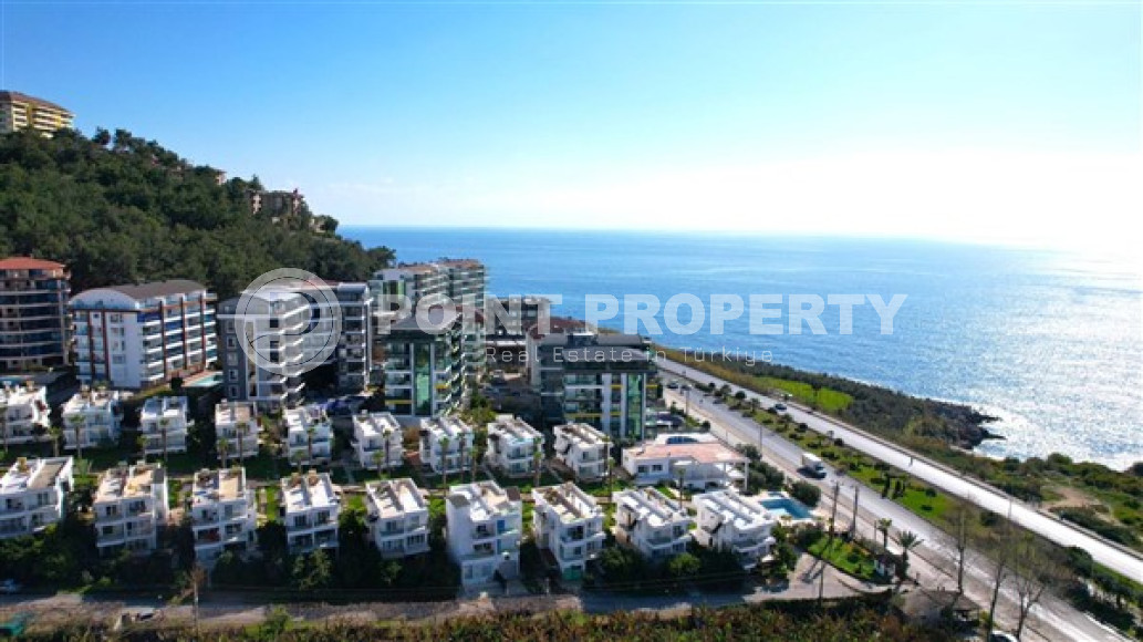 Роскошный дуплекс с видом на море в 50 метрах от пляжа в районе Каргыджак.-id-3821-фото-25