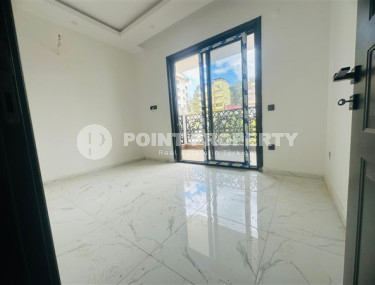 Новая квартира 1+1, общей площадью 50 м2, в доме на финальной стадии строительства.-id-3828-фото-2