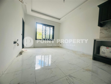 Новая квартира 1+1, общей площадью 50 м2, в доме на финальной стадии строительства.-id-3828-фото-3