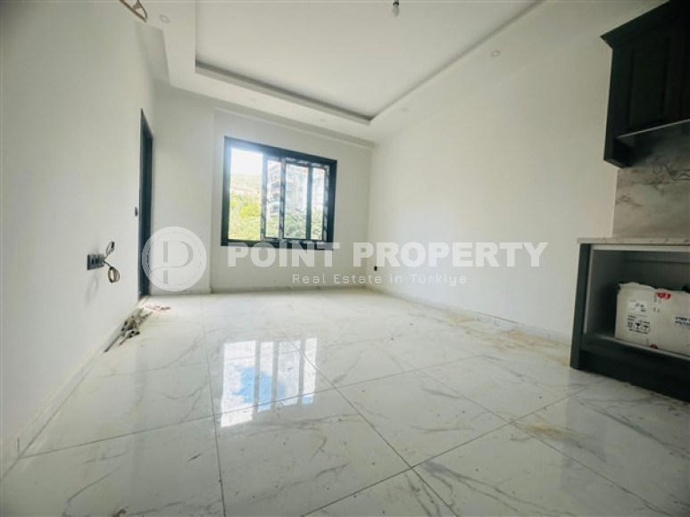 Новая квартира 1+1, общей площадью 50 м2, в доме на финальной стадии строительства.-id-3828-фото-3