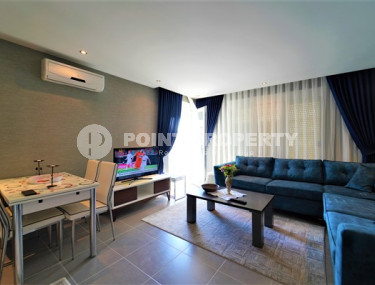 Comfortable three-room apartment with an area of 100 m2, Mahmutlar district-id-3829-photo-1