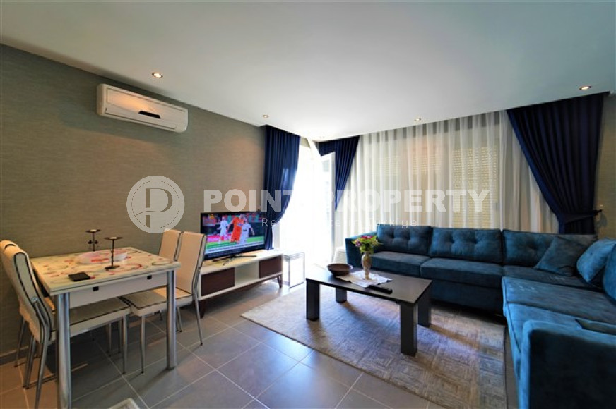 Comfortable three-room apartment with an area of 100 m2, Mahmutlar district-id-3829-photo-1