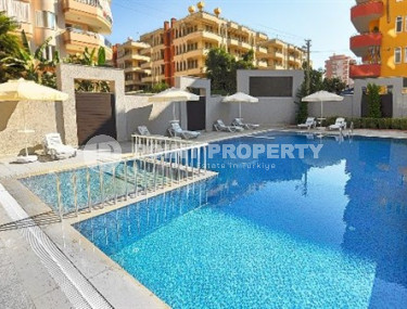 Comfortable three-room apartment with an area of 100 m2, Mahmutlar district-id-3829-photo-3