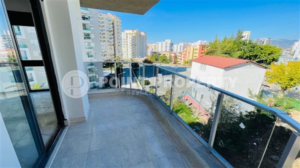 Двухуровневая квартира 2+1 с площадью 115 м2 в новом комплексе 2023 года, район Махмутлар-id-3831-фото-4