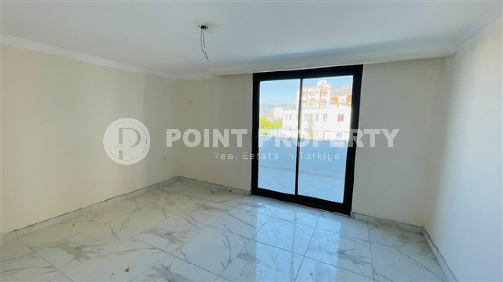 Двухуровневая квартира 2+1 с площадью 115 м2 в новом комплексе 2023 года, район Махмутлар-id-3831-фото-5