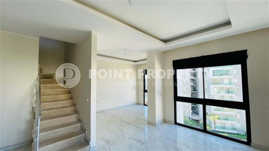 Двухуровневая квартира 2+1 с площадью 115 м2 в новом комплексе 2023 года, район Махмутлар-id-3831-фото-7