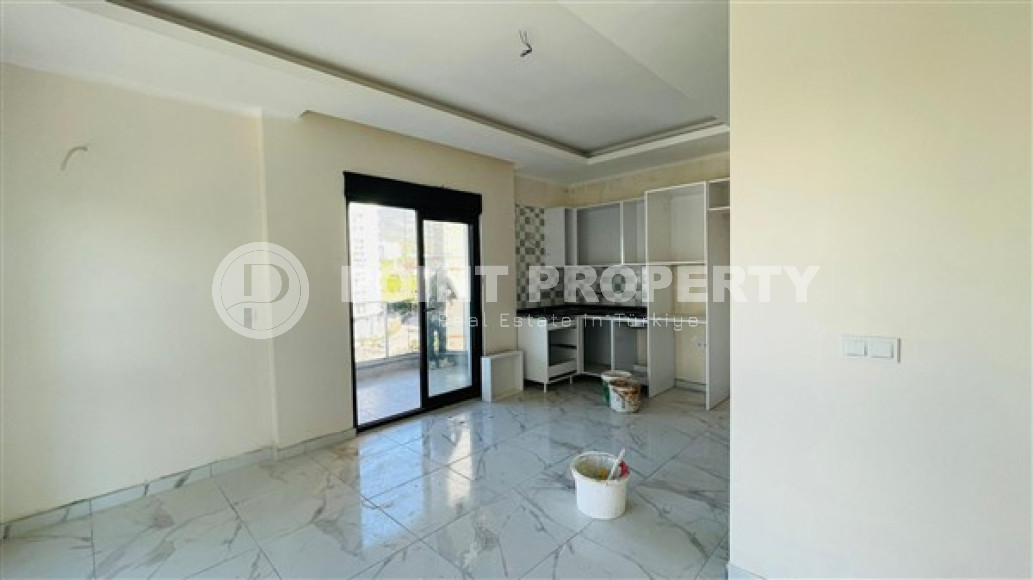 Двухуровневая квартира 2+1 с площадью 115 м2 в новом комплексе 2023 года, район Махмутлар-id-3831-фото-9