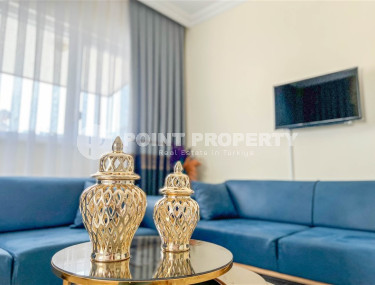 Cozy one-bedroom apartment in the sought-after area of Mahmutlar, just 50 meters from the sea.-id-1325-photo-2