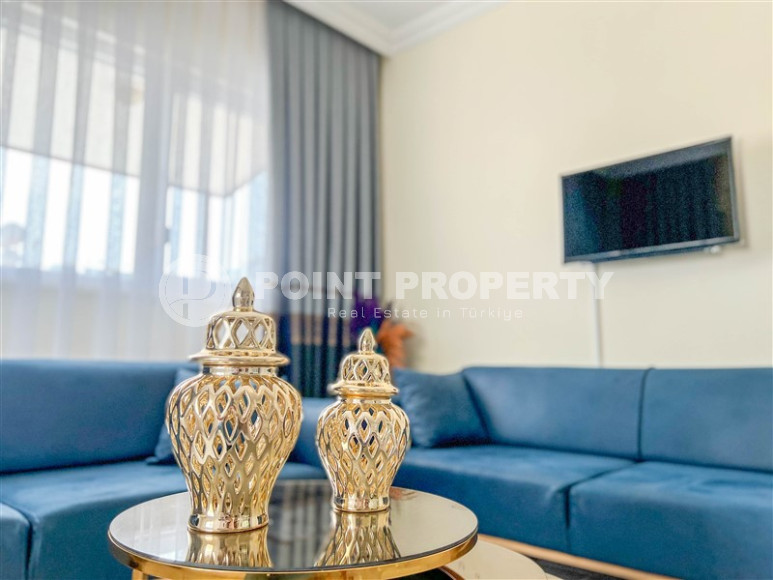 Cozy one-bedroom apartment in the sought-after area of Mahmutlar, just 50 meters from the sea.-id-1325-photo-2