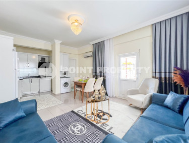 Cozy one-bedroom apartment in the sought-after area of Mahmutlar, just 50 meters from the sea.-id-1325-photo-3
