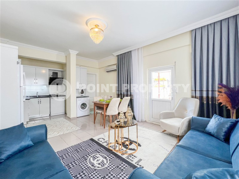 Cozy one-bedroom apartment in the sought-after area of Mahmutlar, just 50 meters from the sea.-id-1325-photo-3