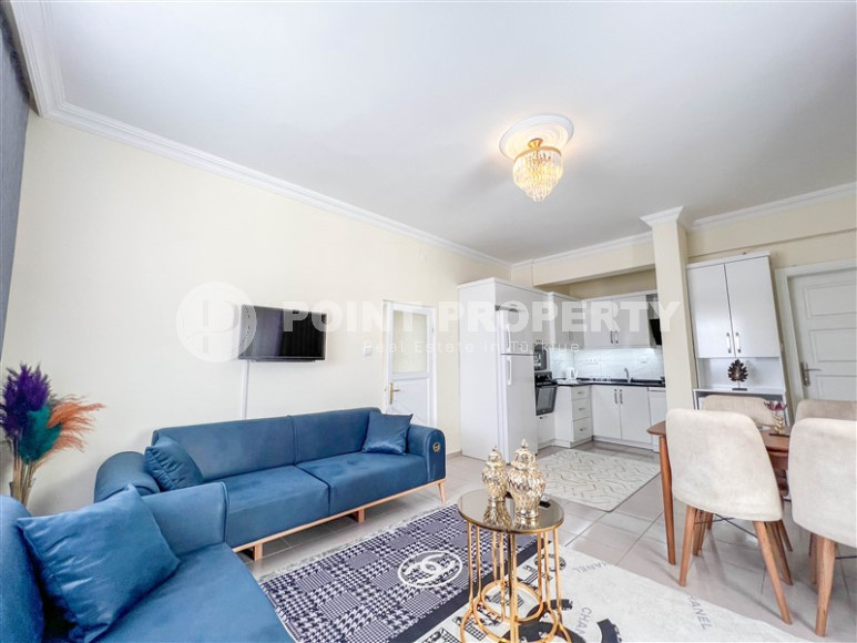 Cozy one-bedroom apartment in the sought-after area of Mahmutlar, just 50 meters from the sea.-id-1325-photo-4