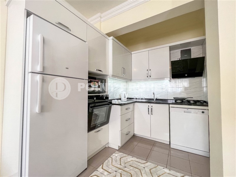 Cozy one-bedroom apartment in the sought-after area of Mahmutlar, just 50 meters from the sea.-id-1325-photo-8