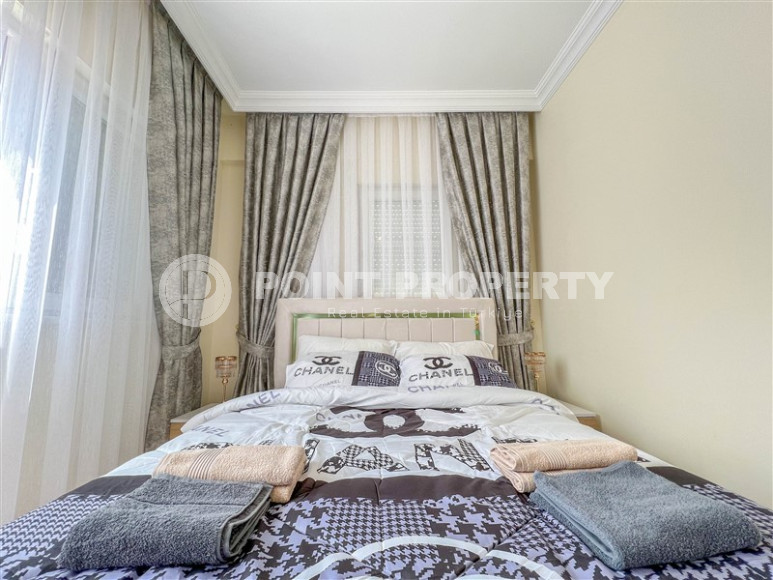 Cozy one-bedroom apartment in the sought-after area of Mahmutlar, just 50 meters from the sea.-id-1325-photo-12