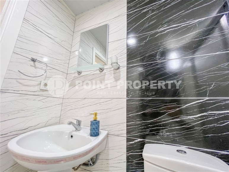 Cozy one-bedroom apartment in the sought-after area of Mahmutlar, just 50 meters from the sea.-id-1325-photo-16