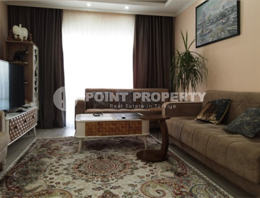Apartment 1+1 with furniture and household appliances 250 meters from the center of Mahmutlar.-id-3843-photo-1