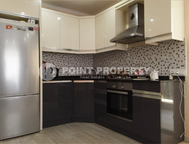 Apartment 1+1 with furniture and household appliances 250 meters from the center of Mahmutlar.-id-3843-photo-2