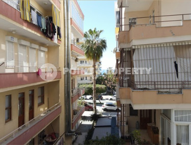 Apartment 1+1 with furniture and household appliances 250 meters from the center of Mahmutlar.-id-3843-photo-4