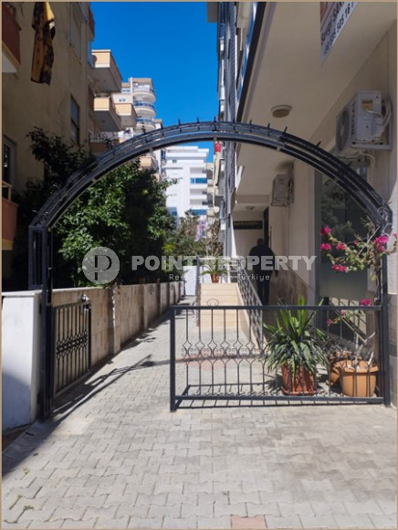 Квартира 1+1 с мебелью и бытовой техникой в 250 метрах от центра района Махмутлар.-id-3843-фото-7