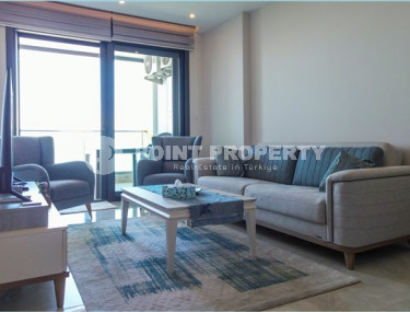 Small modern 1+1 apartment on the first line in the Mahmutlar area.-id-3846-photo-1