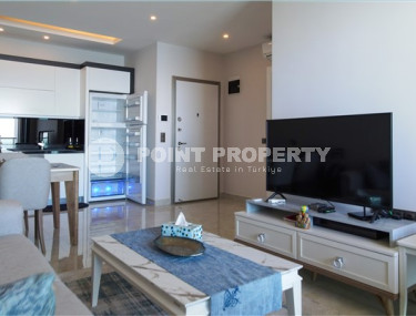 Small modern 1+1 apartment on the first line in the Mahmutlar area.-id-3846-photo-3