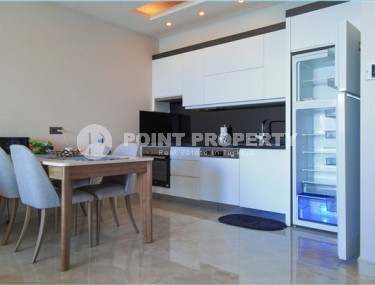 Small modern 1+1 apartment on the first line in the Mahmutlar area.-id-3846-photo-4