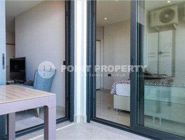 Small modern 1+1 apartment on the first line in the Mahmutlar area.-id-3846-photo-5