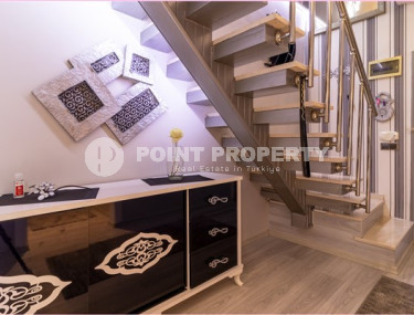 Duplex on the 5th floor with an attic in the very center of Mahmutlar.-id-3847-photo-4