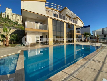 Villa 5+1 with a private pool and garden in the Mahmutlar area.-id-3848-photo-1