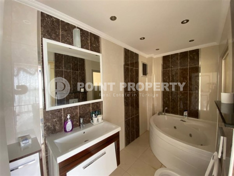 Villa 5+1 with a private pool and garden in the Mahmutlar area.-id-3848-photo-12