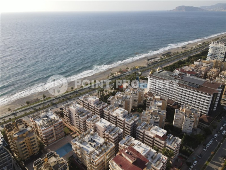 Cozy one-bedroom apartment in the sought-after area of Mahmutlar, just 50 meters from the sea.-id-1325-photo-24