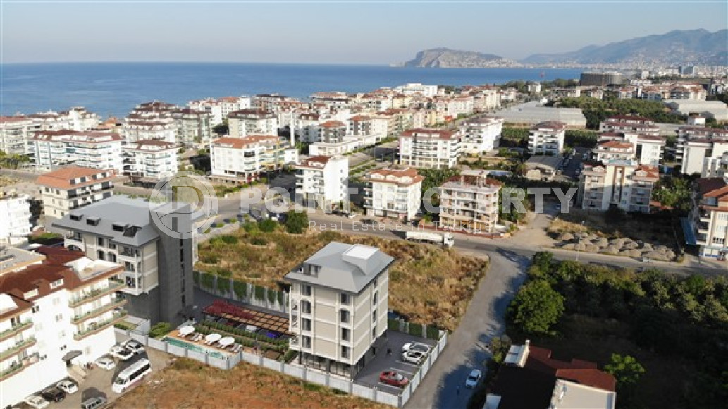 Двухкомнатные апартаменты 55 м2 в красочной резиденции на этапе строительных работ, район Кестель-id-3853-фото-6