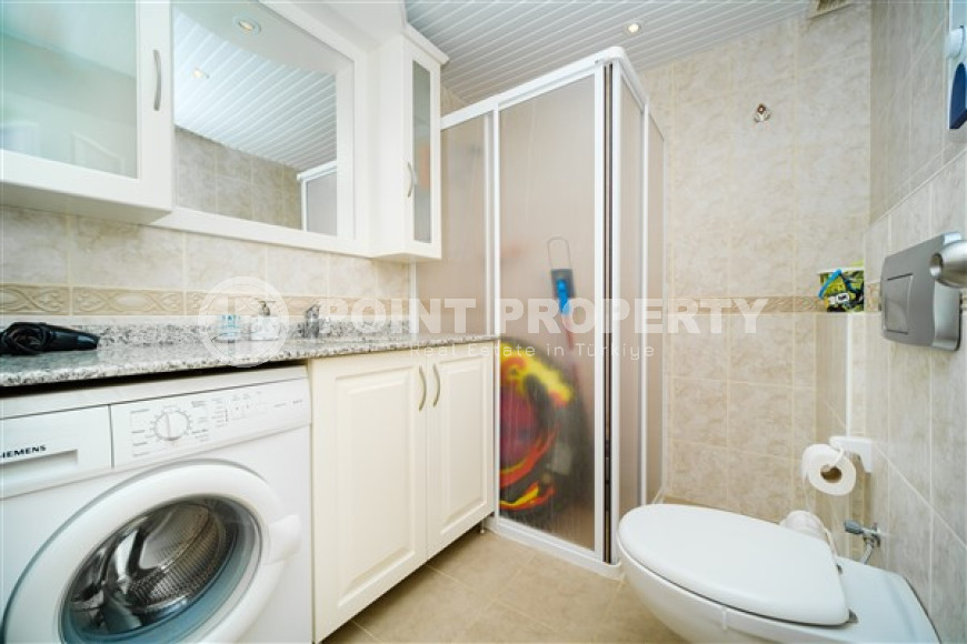 Светлые апартаменты 2+1, общей площадью 115 м2, в благоустроенном престижном районе Тосмур.-id-3858-фото-9