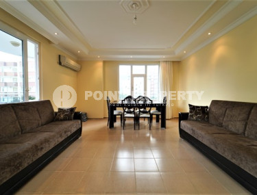 Furnished apartment 2+1, with a total area of 120 m2, on the 4th floor in the center of Mahmutlar.-id-3863-photo-1