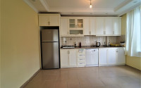 Furnished apartment 2+1, with a total area of 120 m2, on the 4th floor in the center of Mahmutlar.-id-3863-photo-3