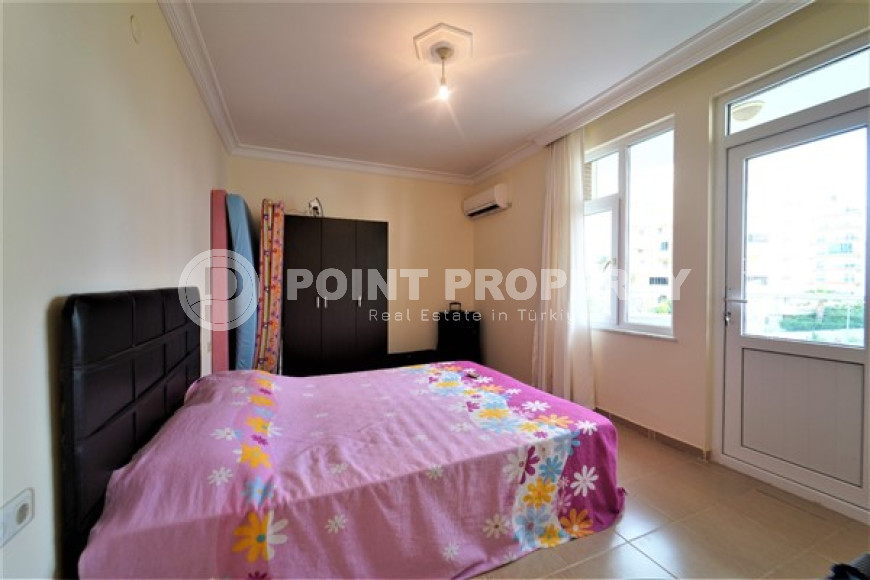 Furnished apartment 2+1, with a total area of 120 m2, on the 4th floor in the center of Mahmutlar.-id-3863-photo-5