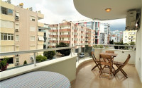 Furnished apartment 2+1, with a total area of 120 m2, on the 4th floor in the center of Mahmutlar.-id-3863-photo-6
